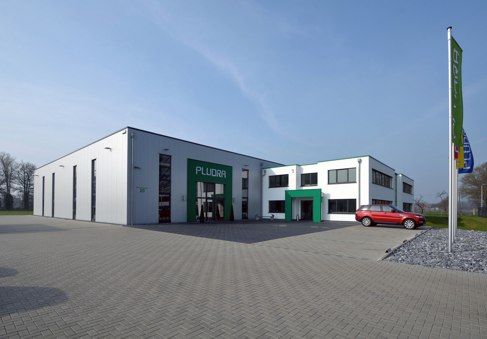 External view of the company building - main entrance | Pludra International